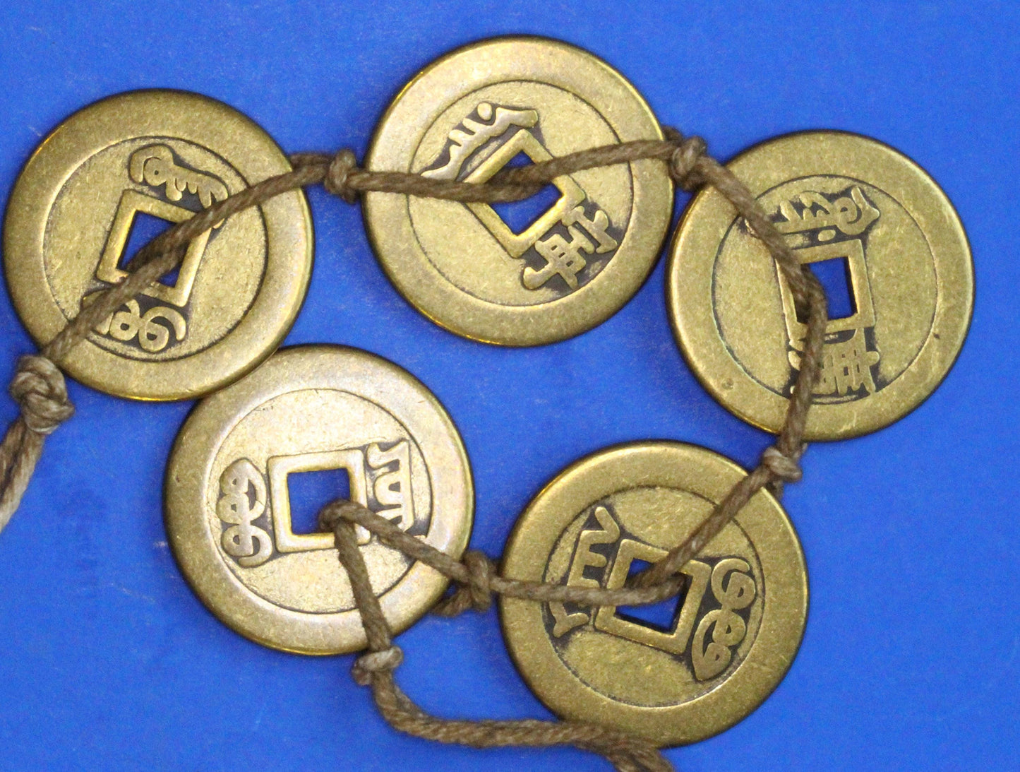 A string Chinese Feng Shui brass coins, "Five Emperors" set, 25mm   [12/25 33904]