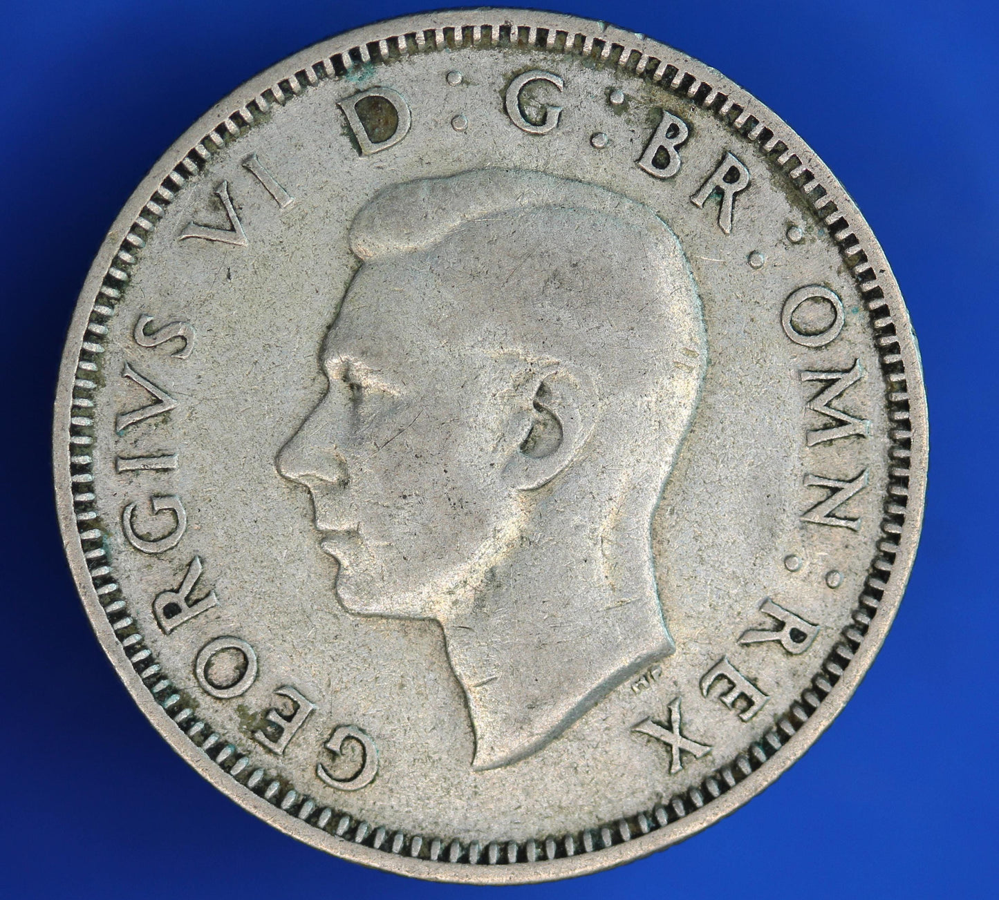 GENUINE British Coin -  1942 George VI One Shilling, 50% silver coin  [02/26 34510]
