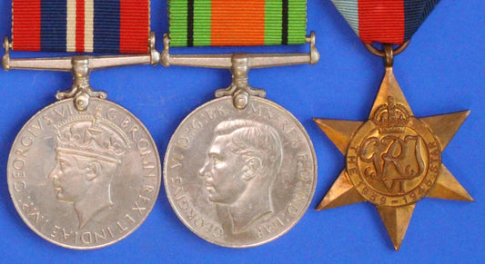 Pair of WW2 medals - George VI, War & Defence Medal with 1939-1945 Star      [02/26 34417]