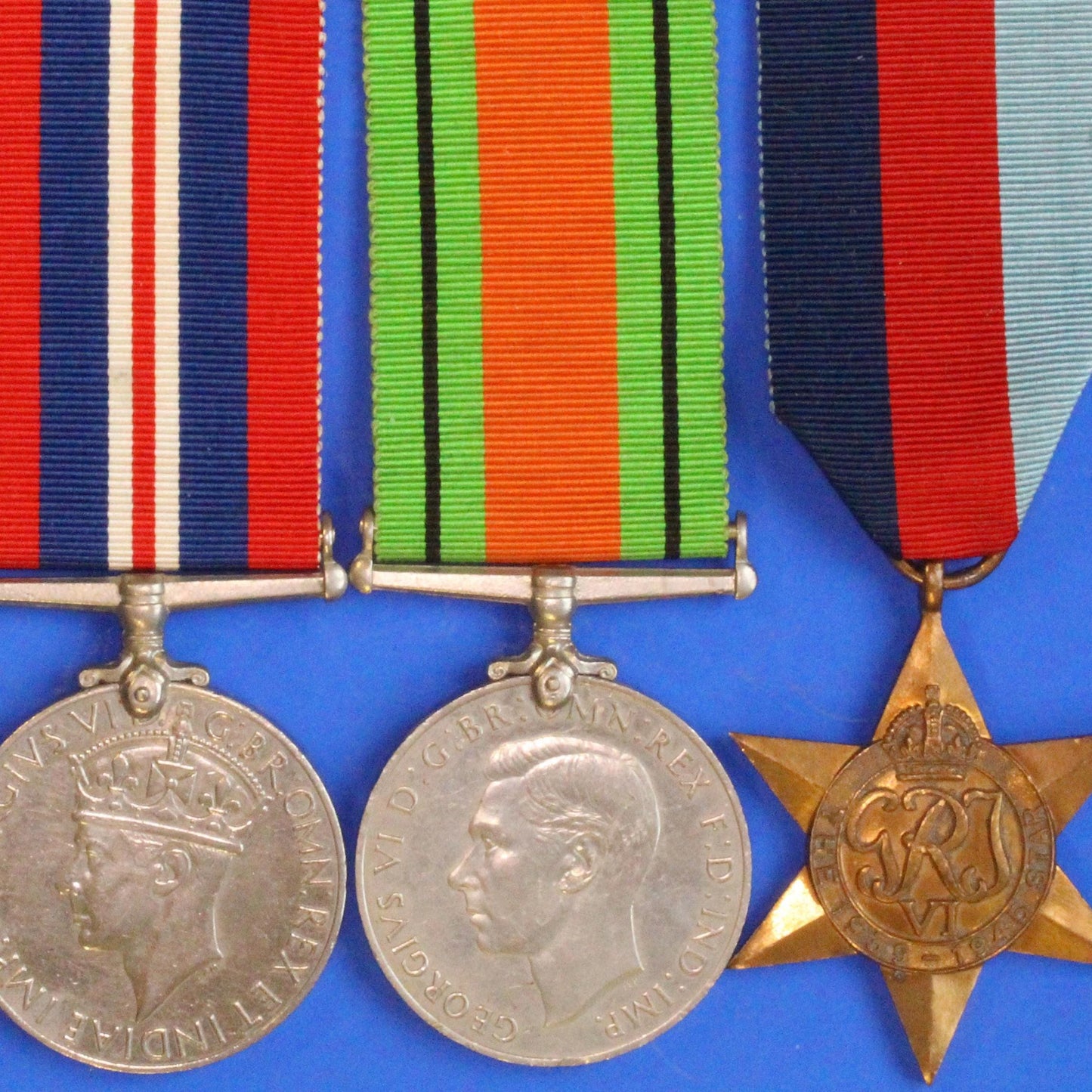 Pair of WW2 medals - George VI, War & Defence Medal with 1939-1945 Star      [02/26 34418]