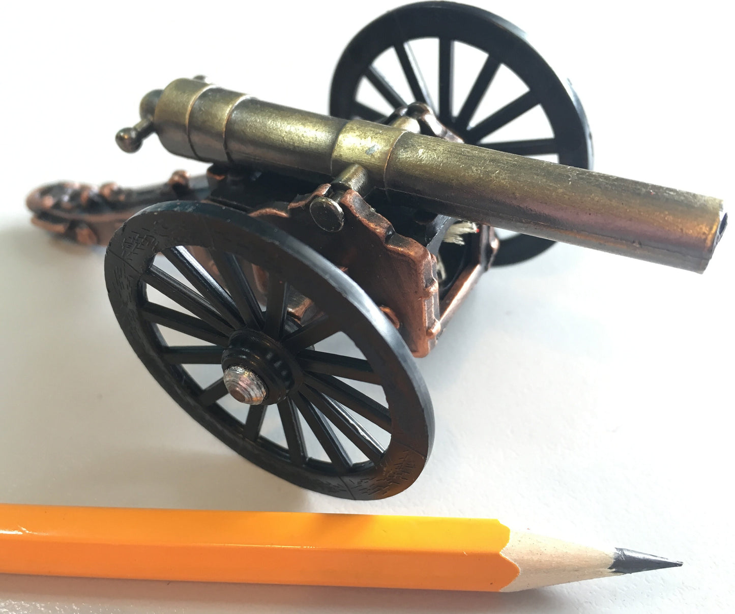 Cannon mounted on a wheeled chassis incorporating a pencil sharpener *[LCAN]